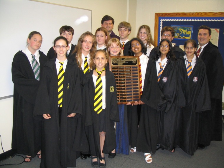 This is a picture of the Defense Against the Dark Arts club. That's me with shsort hair on the far right.